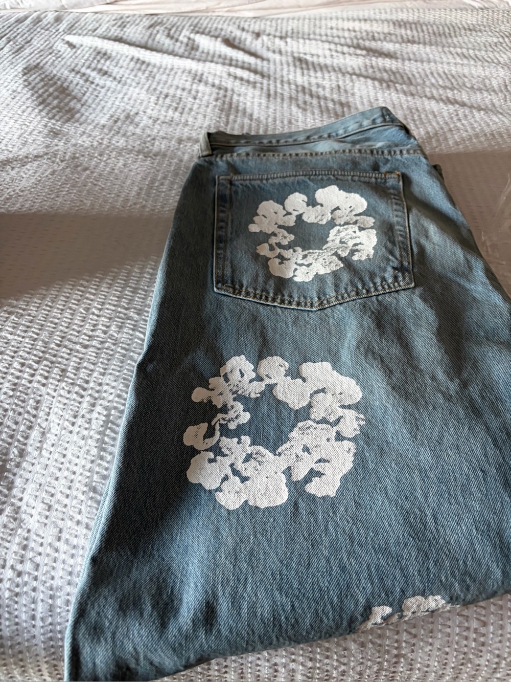 Relaxed Men’s Denim Tears Jeans with White Floral Print